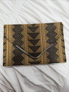 BCBGeneration Black and Tan Woven Envelope Clutch